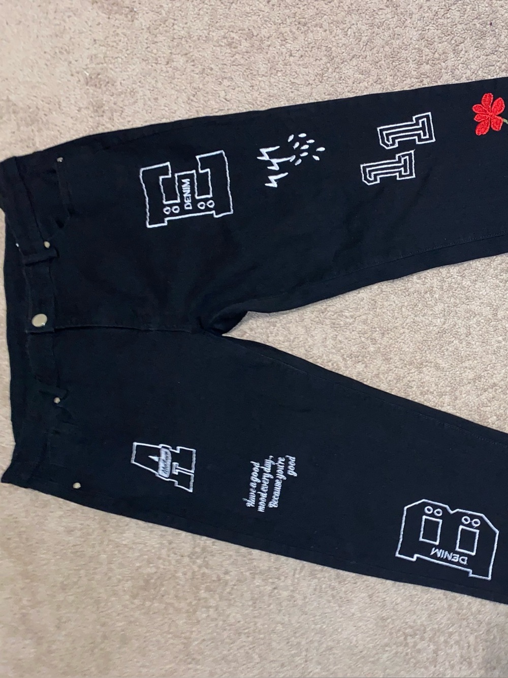 Black Embroidered Patch Denim Jeans with Red Flower
